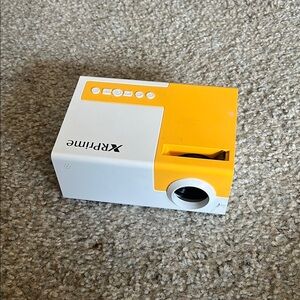 Yellow and White Mini Projector